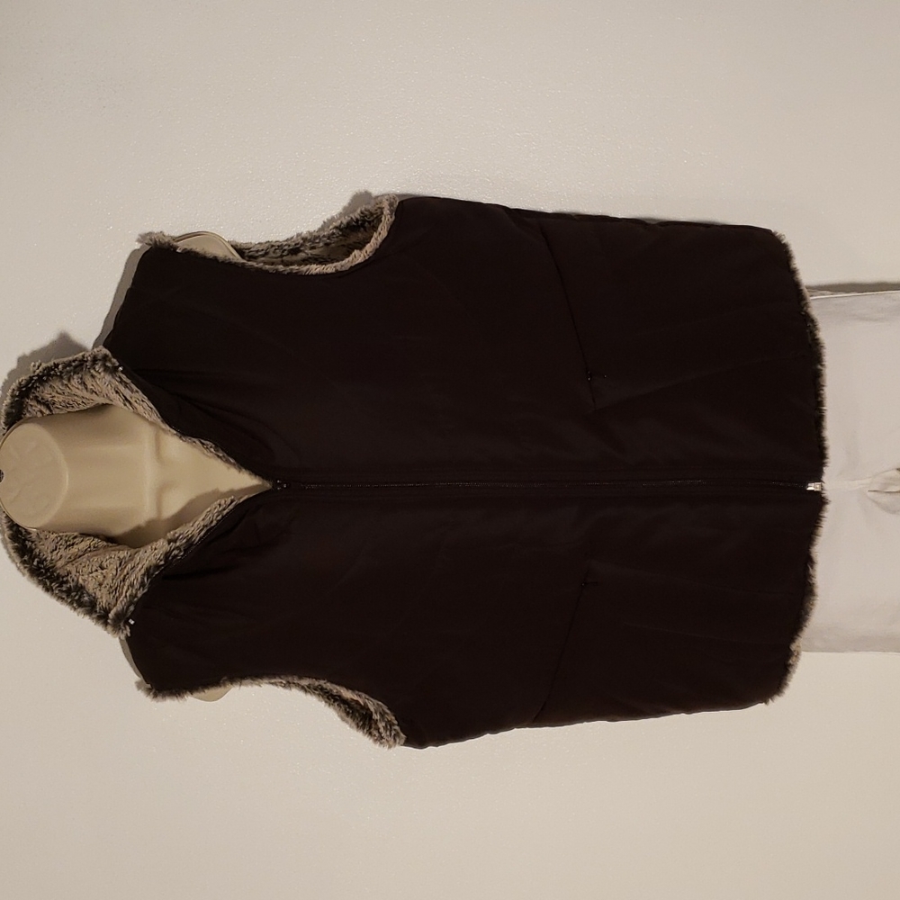 Reversible vest by North 15.  Size S and in excellent condition.